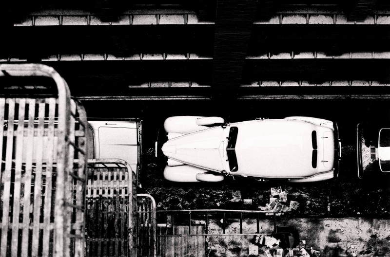 Untitled (Aerial View of Parked Car)