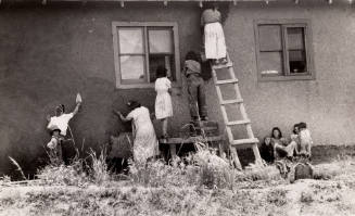 General View of Plastering an Adobe House, New Mexico