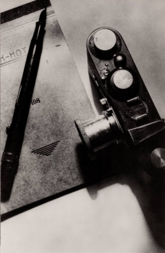 Still Life of Camera, Pen and Tablet