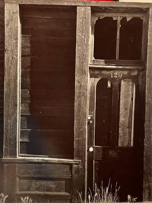 Untitled (Locked door with broken windows)