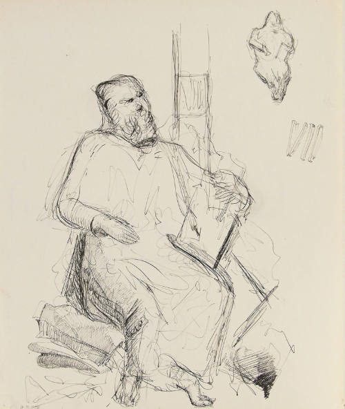 Untitled (Man sitting holding a book)