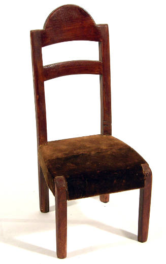 Chair with two back rest rungs and velveteen seat.