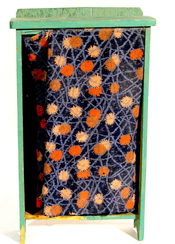 Green closet with cloth curtain